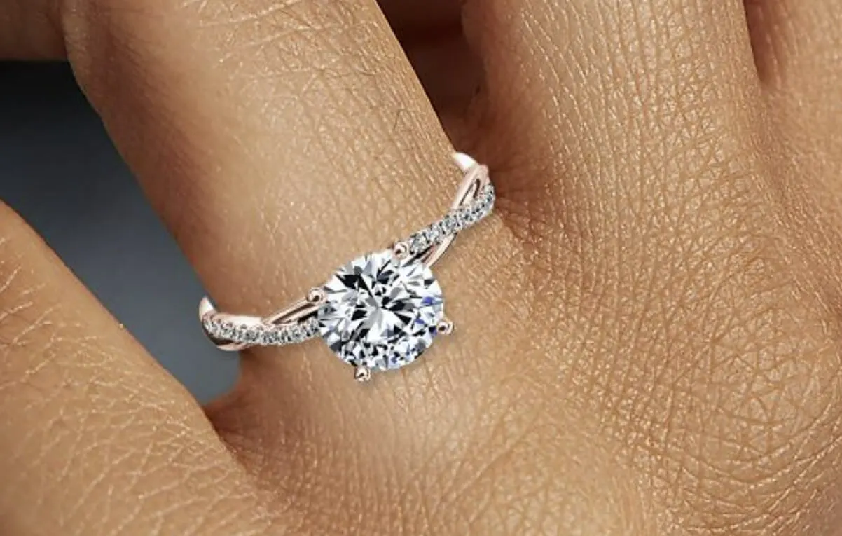 pave solitaire swirl engagement ring 